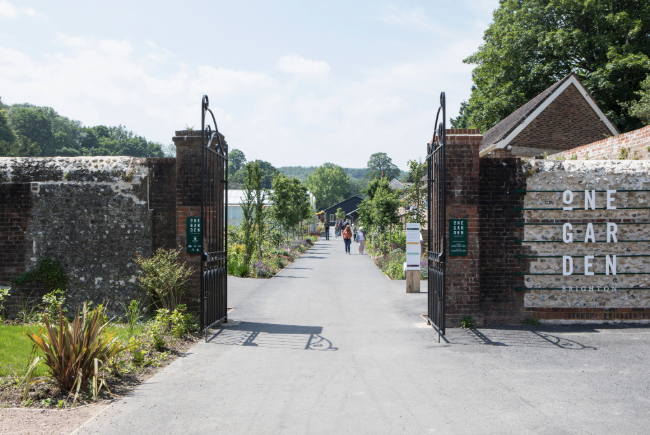 One Garden the gates open on to a beautiful garden beyond.